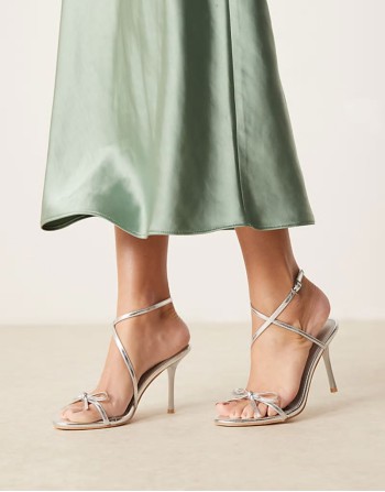 bow heeled sandals in silver crinkle