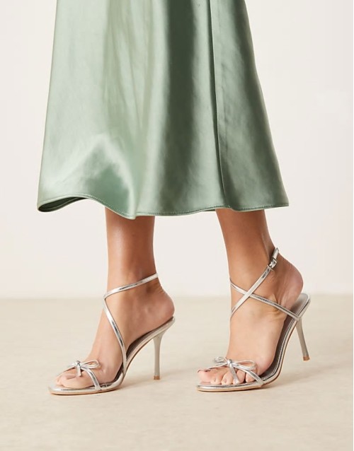 bow heeled sandals in silver crinkle